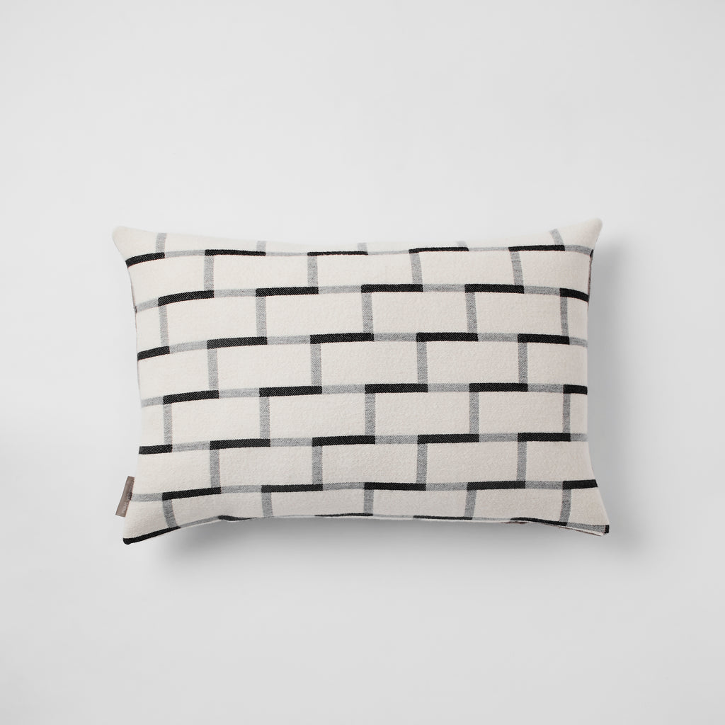 Contemporary, merino wool cushion. Geometric, monochrome design. Woven in England. 