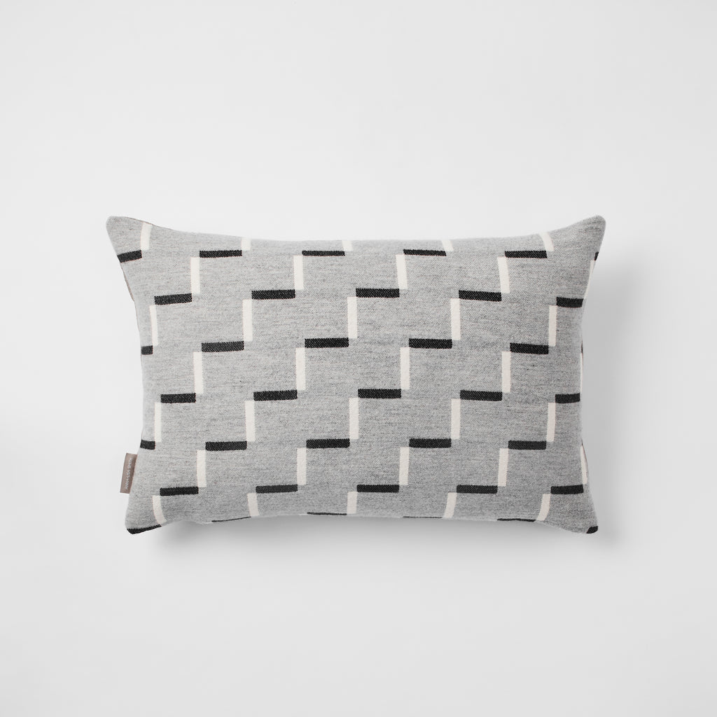 Contemporary, grey, merino wool cushion. Geometric, monochrome design. Woven in England.