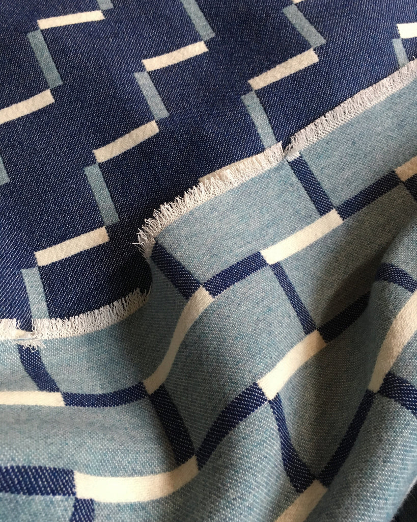 Contemporary, blue blanket. Merino wool, woven in England.