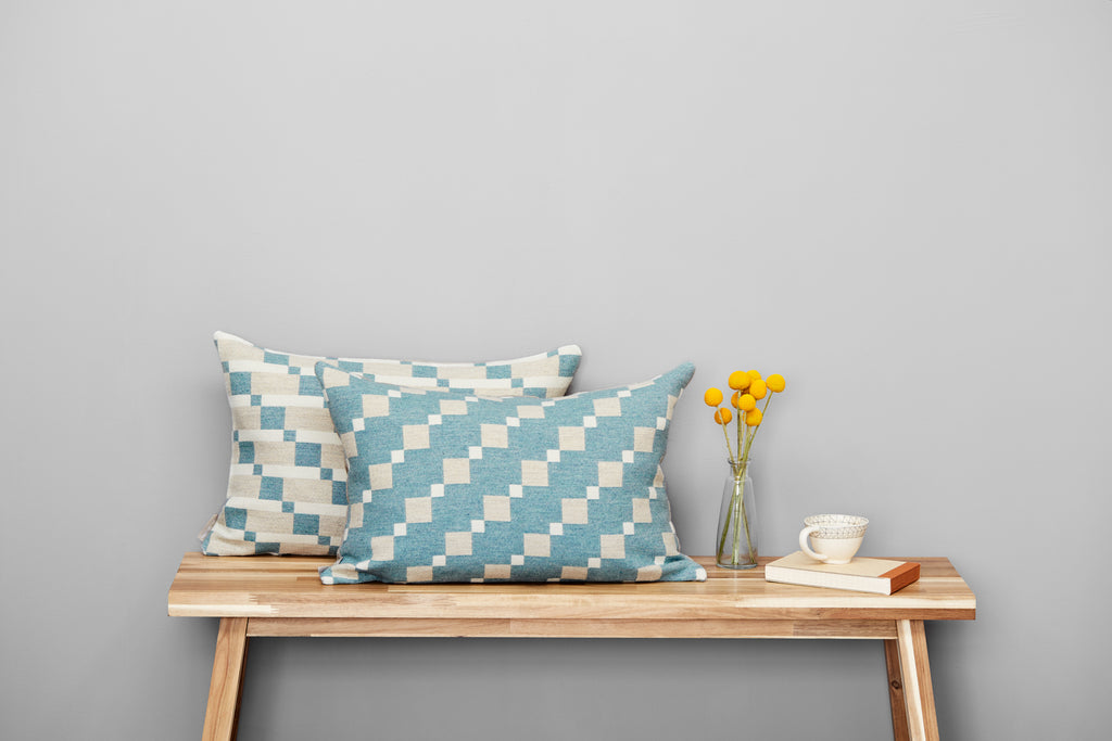 Contemporary merino wool cushions woven in England in a beautiful soft shade of Teal