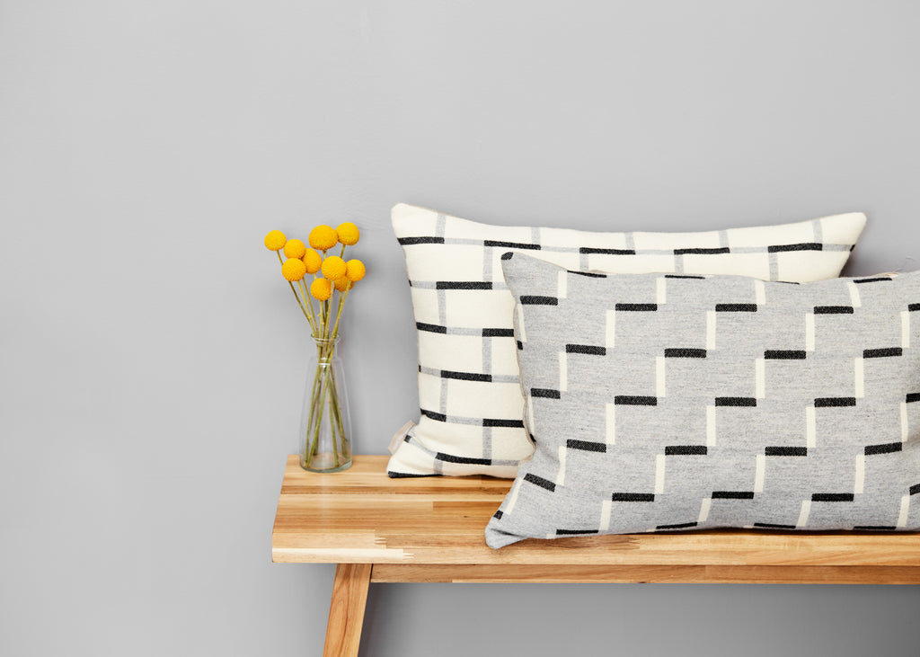 Contemporary, grey, merino wool cushion. Geometric, monochrome design. Woven in England.