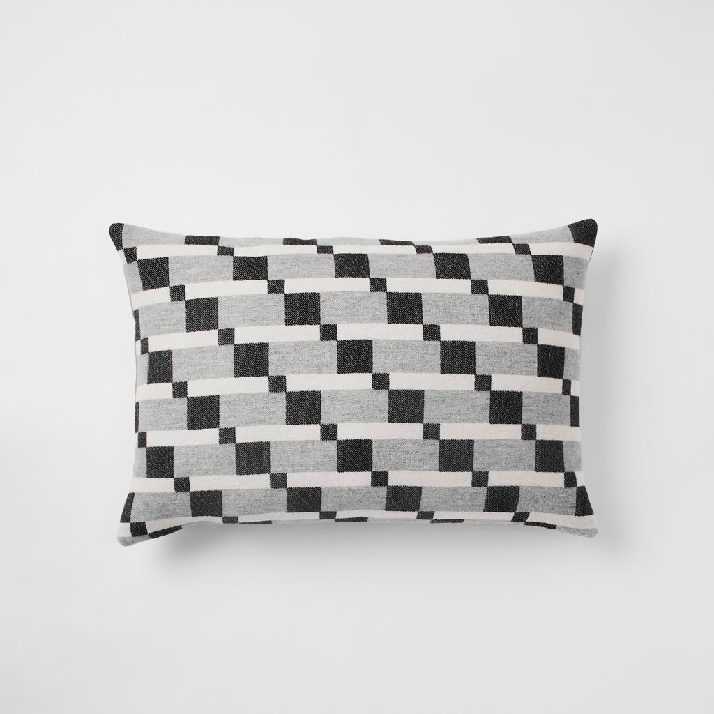 Contemporary , monochrome, merino wool cushion woven in England, perfect for sofa or bed.