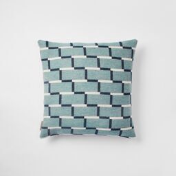 Contemporary merino wool cushion, teal and navy blue. Woven in England.