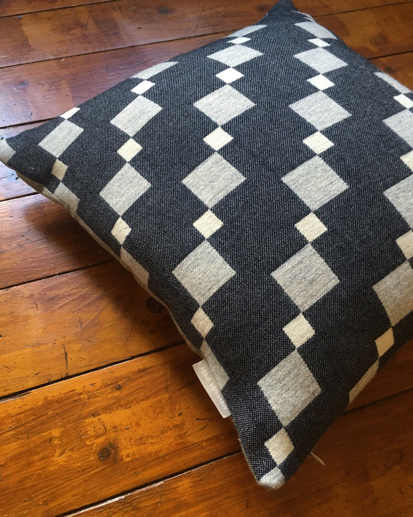 Contemporary cushion, woven in merino wool in our Yorkshire mill. Striking geometric design